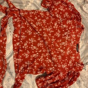 Red tie blouse with flower detailing